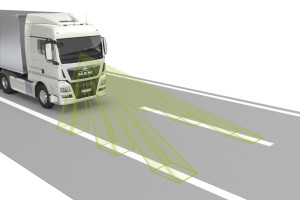 LGS lane guard system with latest camera technology: July 2015 sees MAN introducing the new generation of advanced emergency braking system with sensor fusion (EBA emergency brake assist) and the emergency stop signal (ESS). At the same time the EBA and also the new lane guard system (LGS) will become standard accessories in those vehicle models to which mandatory equipment requirements apply for new registrations from November onwards. This includes the vast majority of MAN trucks, both MAN and NEOPLAN coaches and intercity buses, and also MAN coach chassis. DE: Spurassistent LGS mit neuester Kameratechnologie: MAN führt ab Juli 2015 die neue Generation des Notbremsassistenten mit Sensorfusion (Emergency Brake Assist, EBA) und das Notbremssignal ESS ein. Gleichzeitig wird EBA sowie der neue Spurhalteassistent (Lane Guard System, LGS) zur Serienausstattung in den Fahrzeugtypen, für die ab November die Ausrüstungspflicht für Neuzulassungen gilt. Dies umfasst den allergrößten Teil der Lkw von MAN, Überland- und Reisebusse von MAN und NEOPLAN, sowie MAN Chassis für Reisebusse. UK: LGS lane guard system with latest camera technology: July 2015 sees MAN introducing the new generation of advanced emergency braking system with sensor fusion (EBA emergency brake assist) and the emergency stop signal (ESS). At the same time the EBA and also the new lane guard system (LGS) will become standard accessories in those vehicle models to which mandatory equipment requirements apply for new registrations from November onwards. This includes the vast majority of MAN trucks, both MAN and NEOPLAN coaches and intercity buses, and also MAN coach chassis.